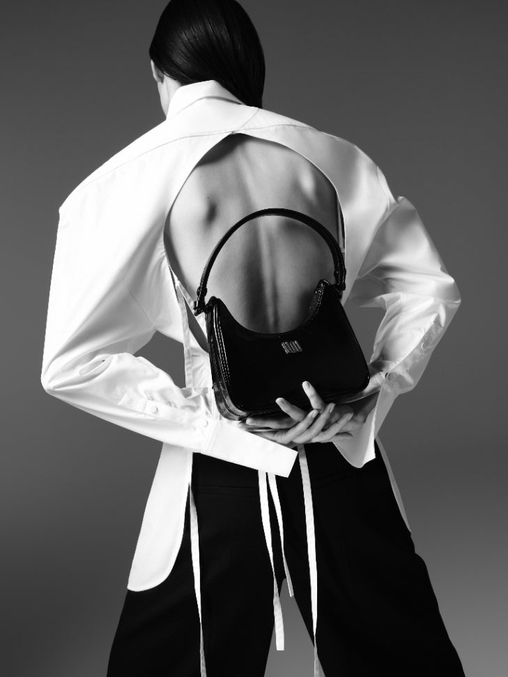 Onyx Noir hobo bag in glossy black patent leather