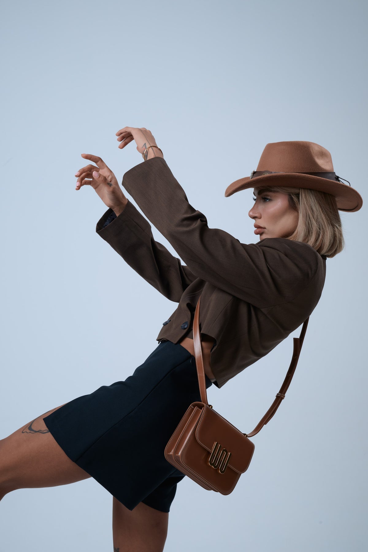 White Noise The Label Pyrite Honey crossbody bag, styled editorial detail