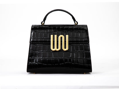 White Noise The Label Bronzite Noir satchel, studio front view