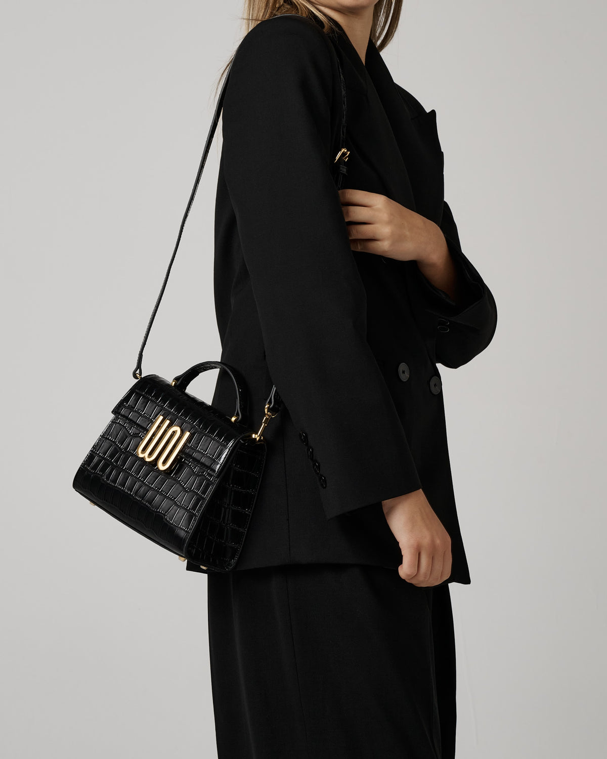 White Noise The Label Bronzite Noir satchel, styled editorial detail