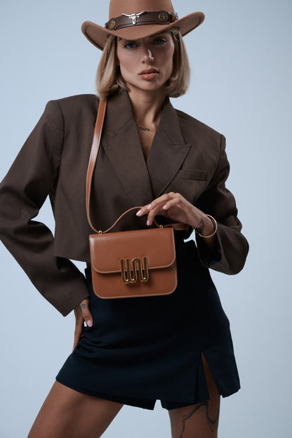 White Noise The Label Pyrite Honey crossbody bag, styled editorial detail