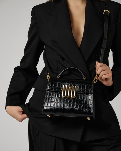 White Noise The Label Bronzite Noir satchel, styled editorial detail