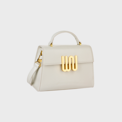 Bronzite Nougat top handle bag in creamy nougat leather with crocodile texture