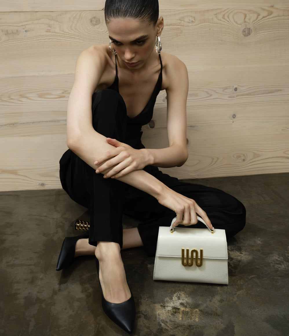 Bronzite Nougat top handle bag in creamy nougat with hand-embossed crocodile texture