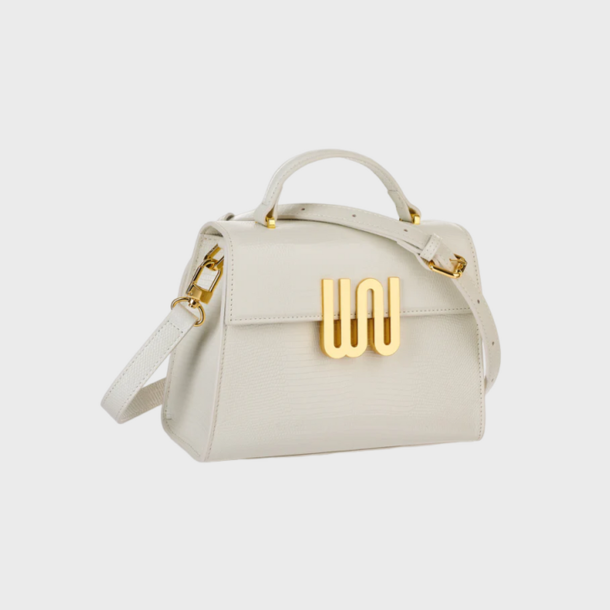 Bronzite Nougat top handle bag in creamy nougat leather with embossed crocodile texture