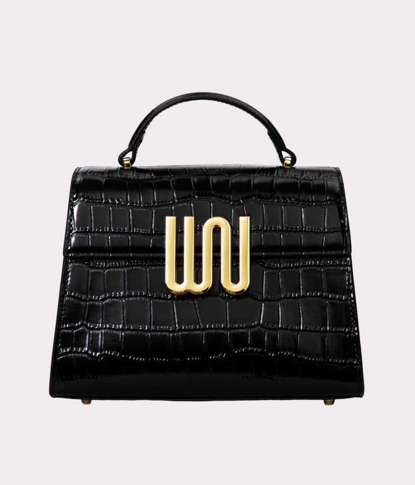 Bronzite Noir top handle bag in deep matte black with hand-embossed crocodile texture
