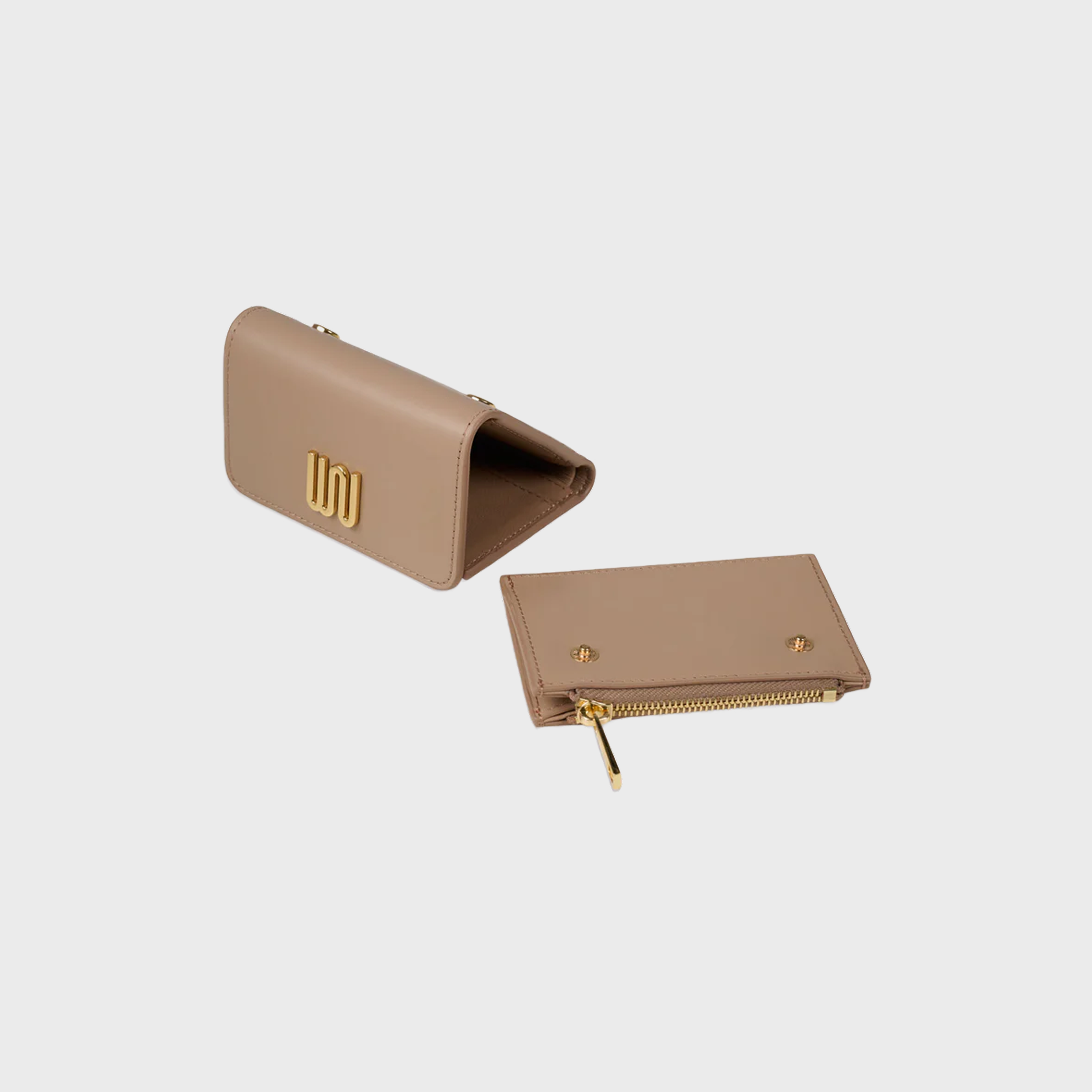 Beige wallet with gold zipper and logo on a light gray background