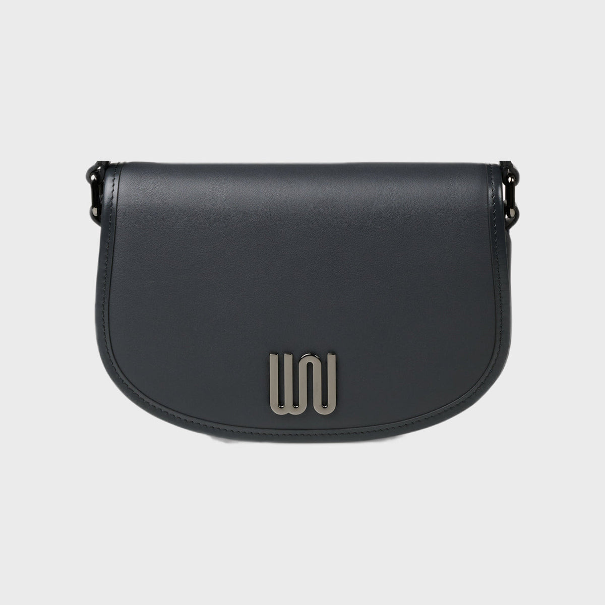 Black shoulder bag on a light gray background