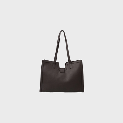 Black handbag on a light gray background