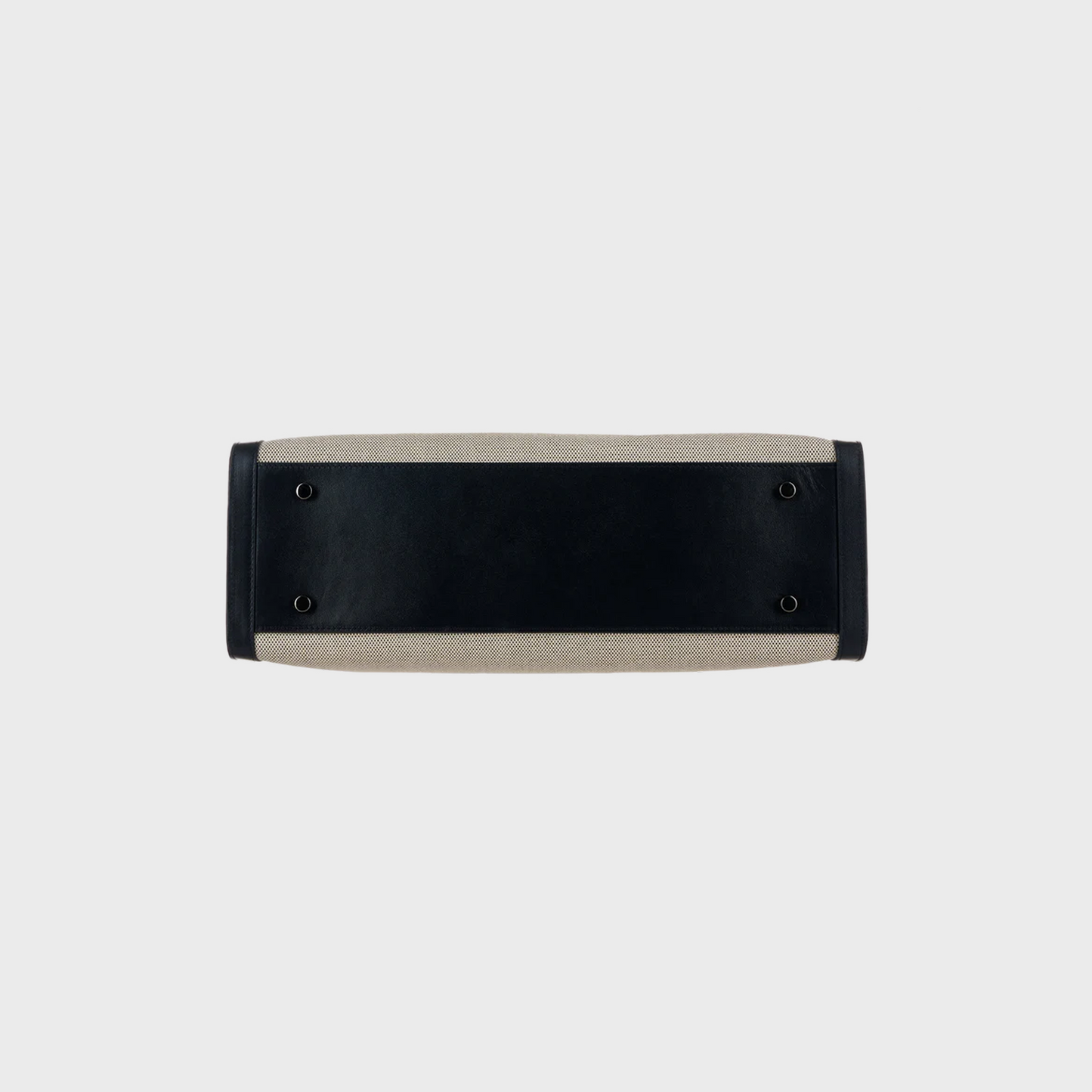 Black and beige rectangular cushion on a white background