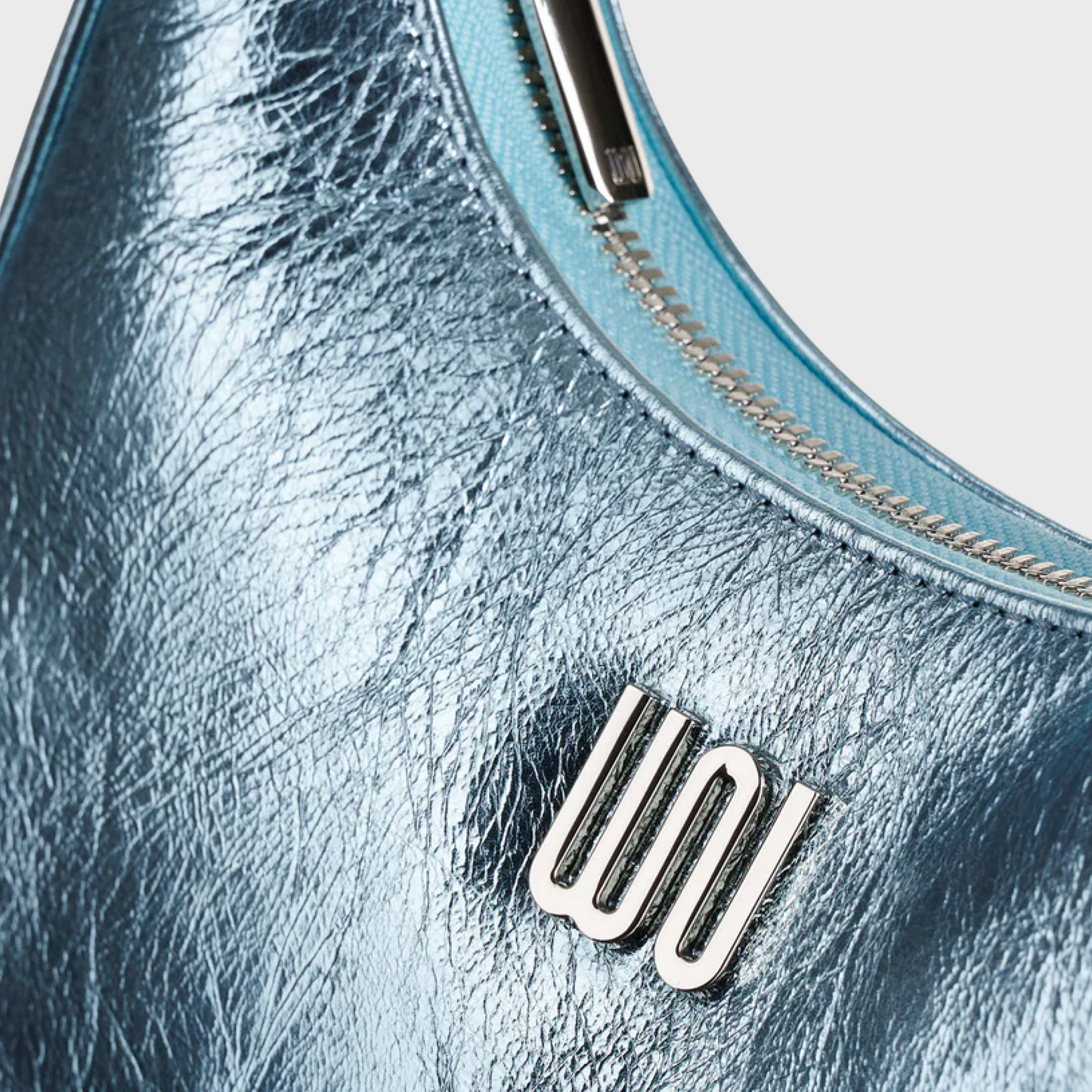 Onyx Aqua hobo bag in glossy aqua patent leather