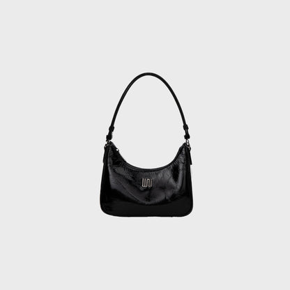 Onyx Noir hobo bag in glossy black patent leather