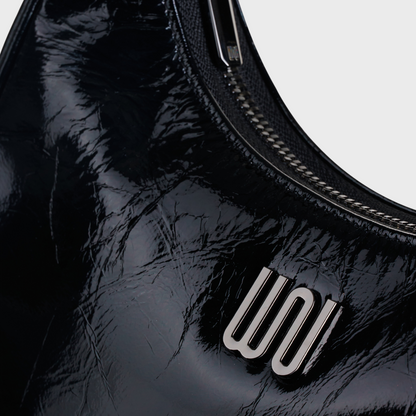 Onyx Noir hobo bag in glossy black patent leather