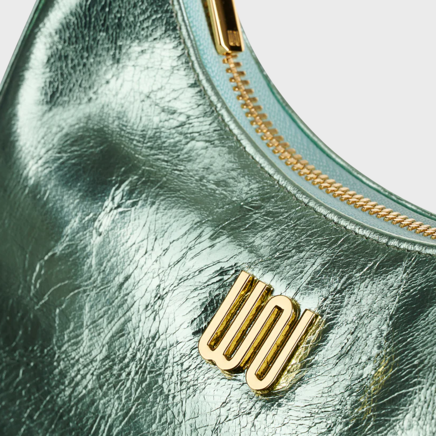 Onyx Pistachio hobo bag in glossy patent leather