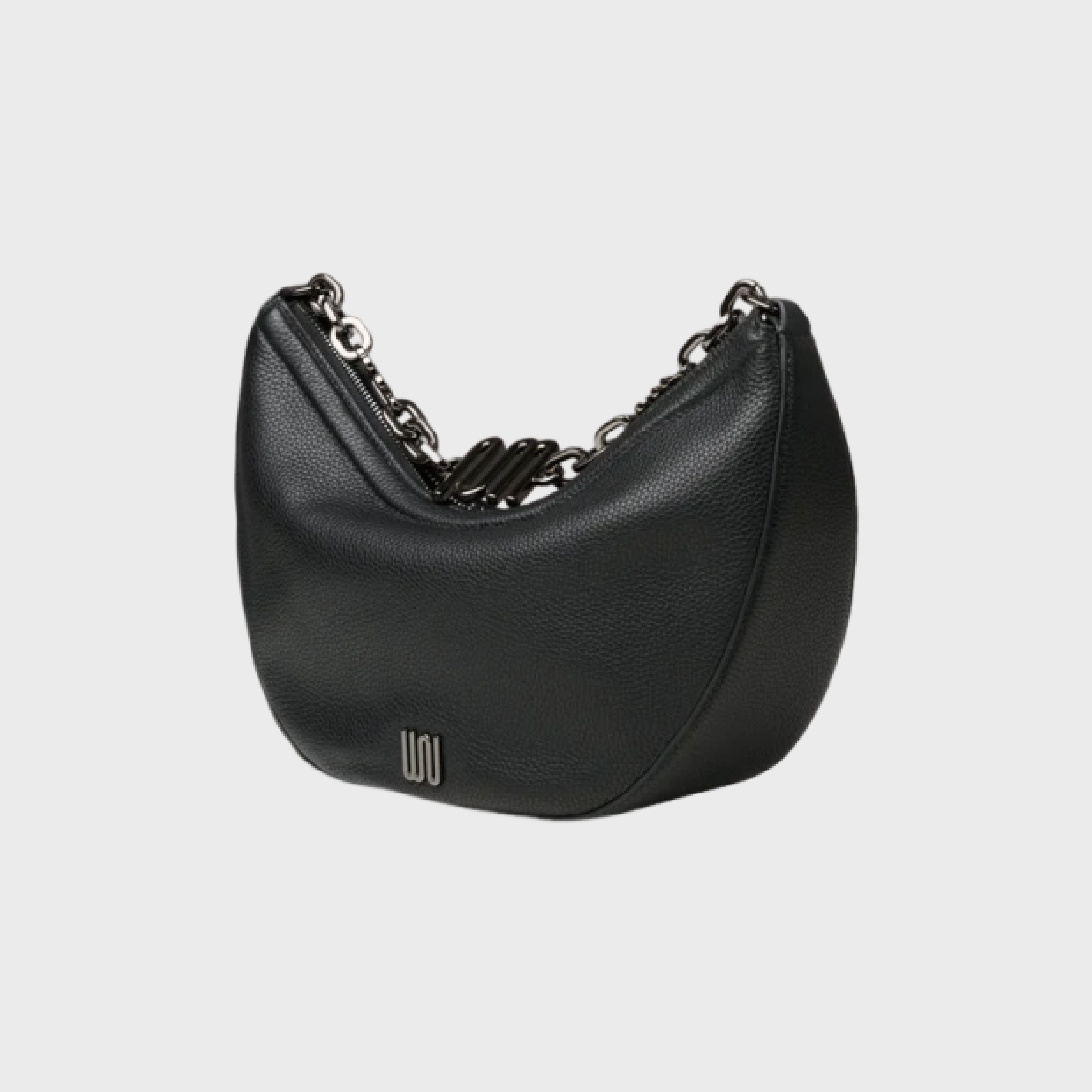 Black handbag with chain detail on a light gray background
