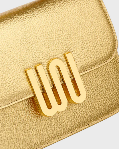 Pyrite Golden gold WN logo close-up