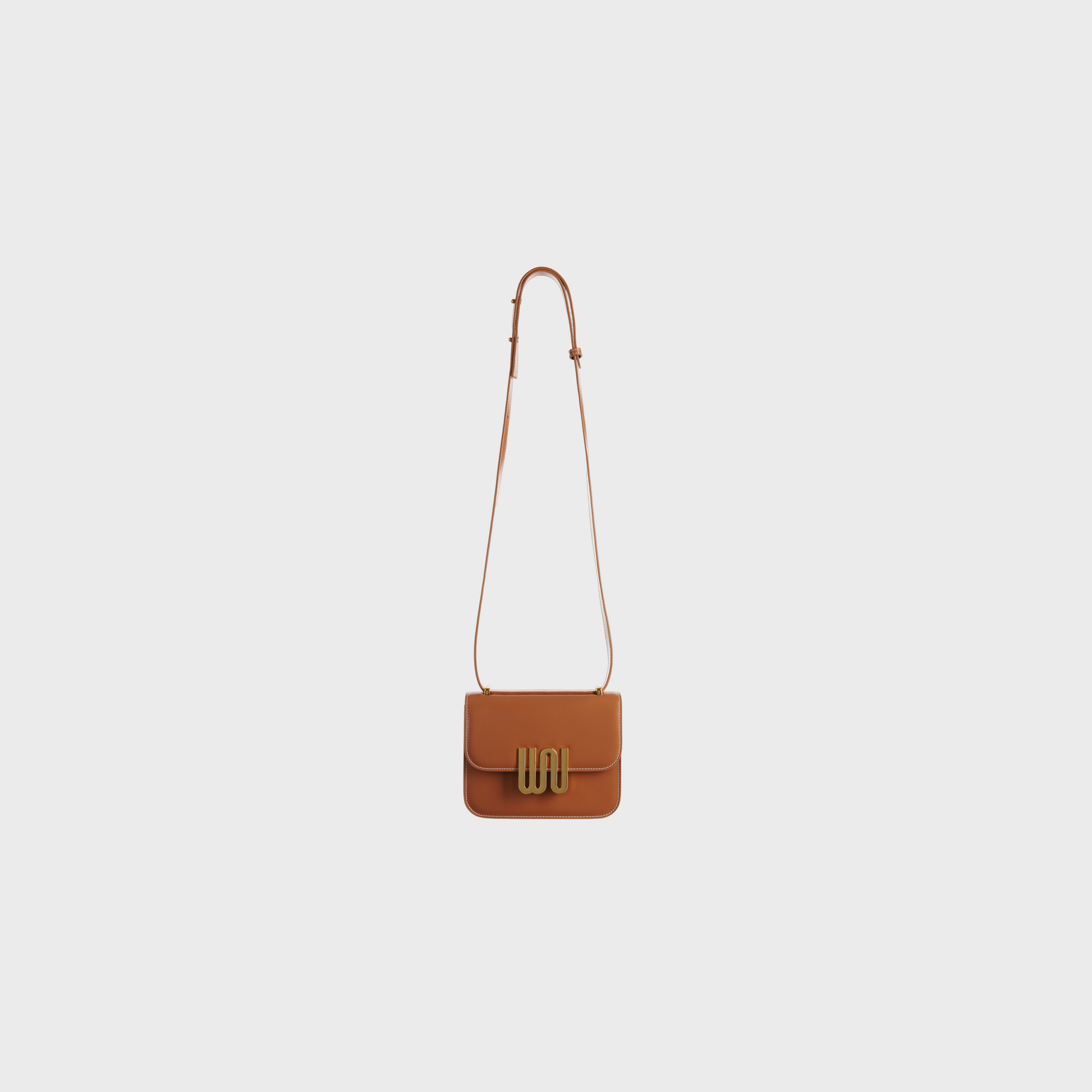 Pyrite Honey tan leather crossbody bag with gold hardware