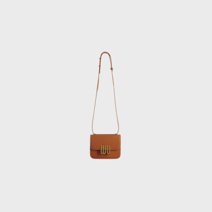 Pyrite Honey tan leather crossbody bag with gold hardware