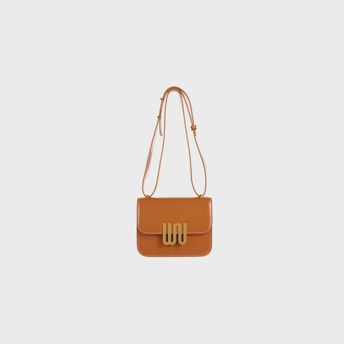 Pyrite Honey tan leather crossbody bag with gold hardware