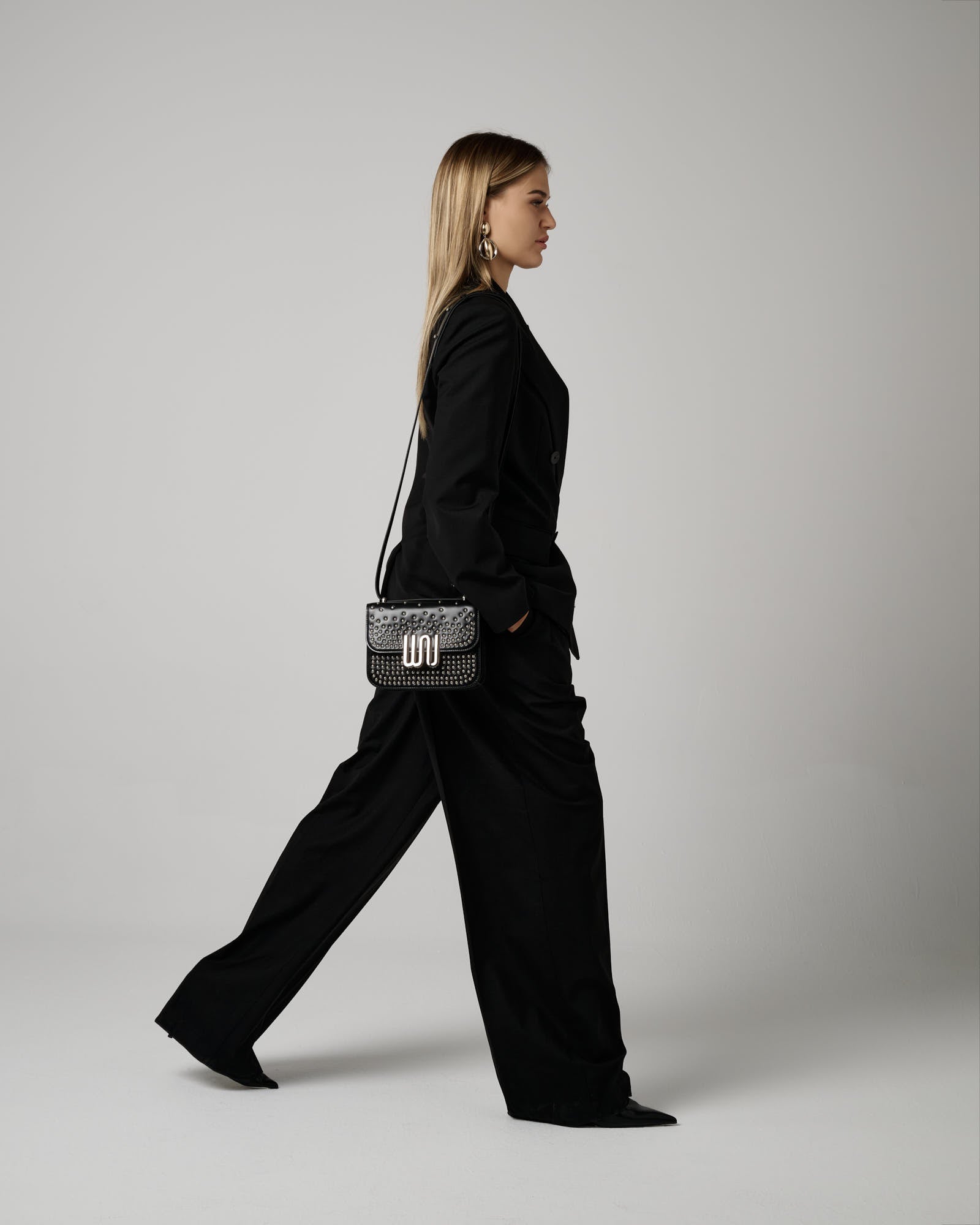 Pyrite Noir Studded shoulder bag in black leather