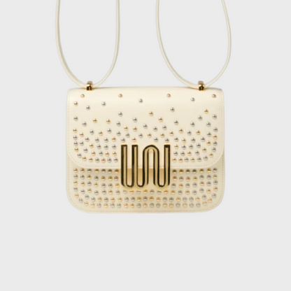 Pyrite Nougat studded mini bag in Togo leather