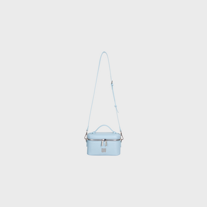 Light blue handbag with a strap on a white background