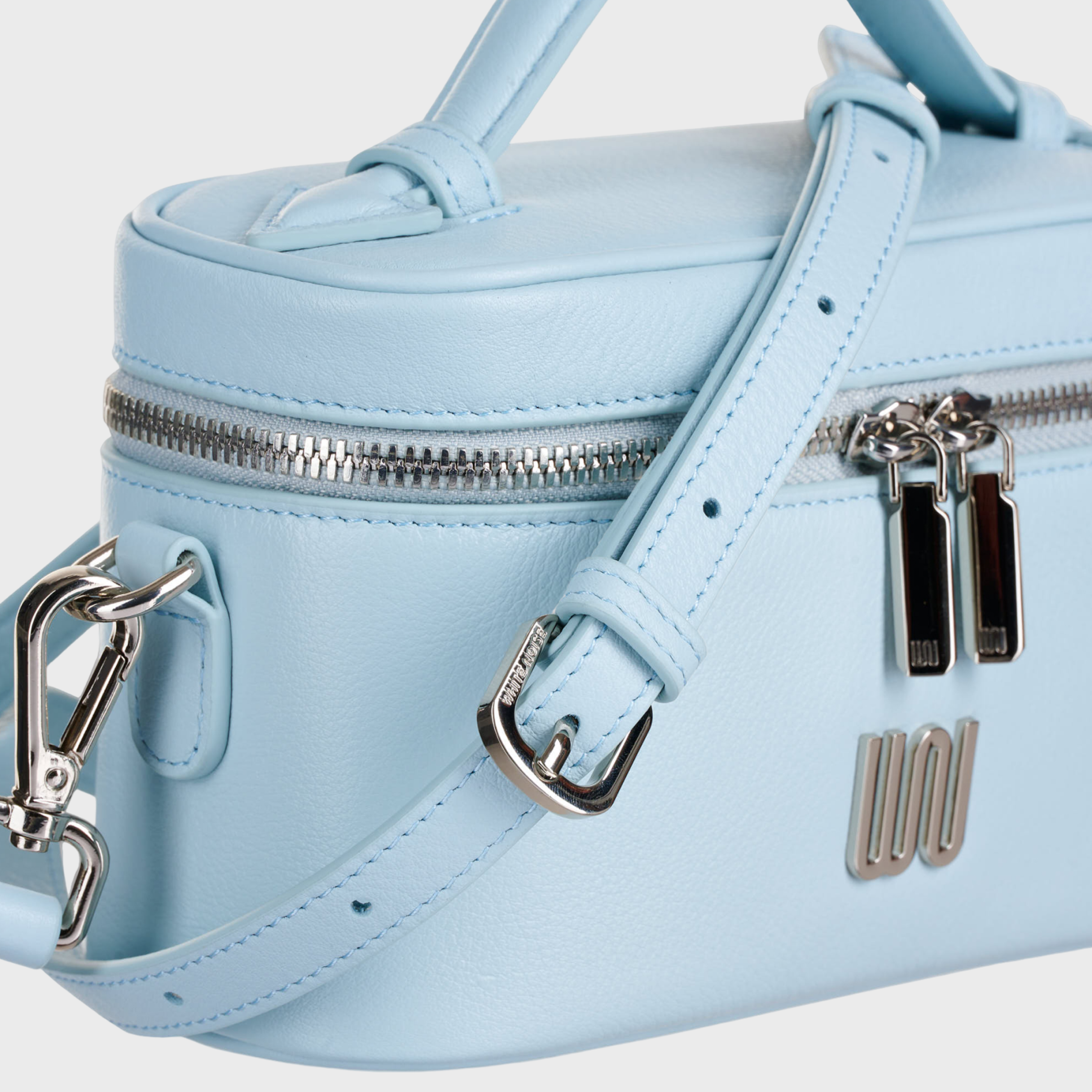 Quartz Azure vanity bag in soft azure with pebbled leather texture