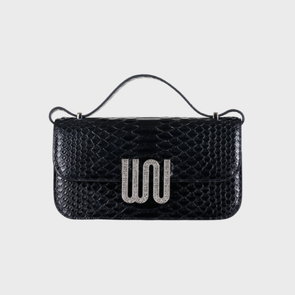 Selenite Noir bag in Togo leather with snake detail