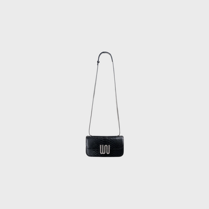 Selenite Noir bag in Togo leather with snake detail