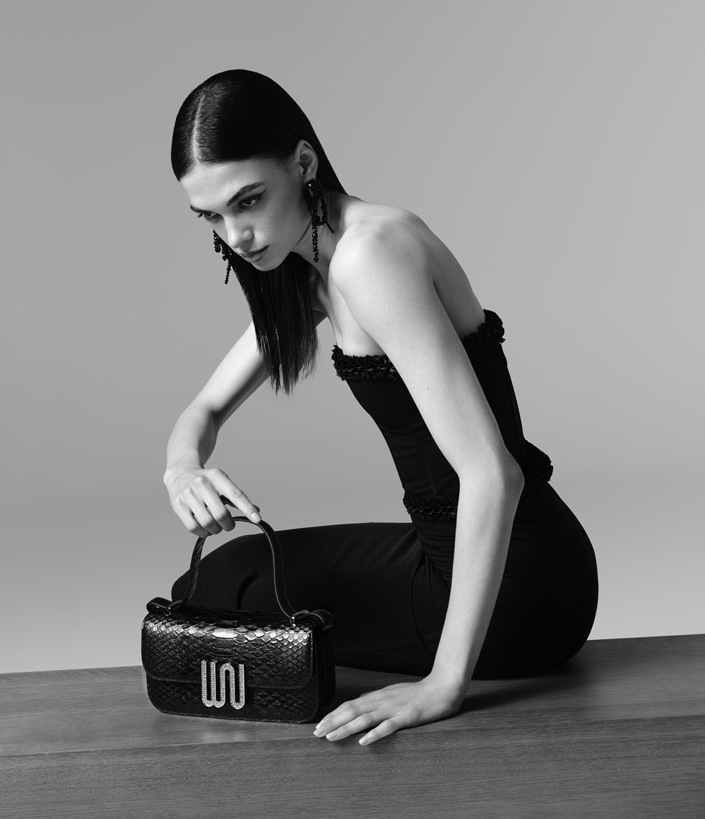 Selenite Noir bag in Togo leather with snake detail