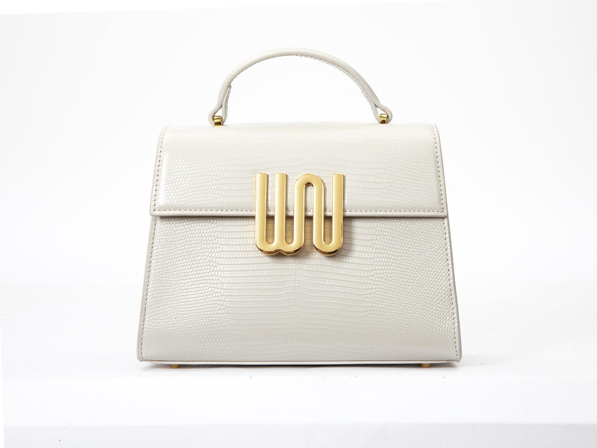 White Noise The Label Bronzite Nougat top handle bag, studio front