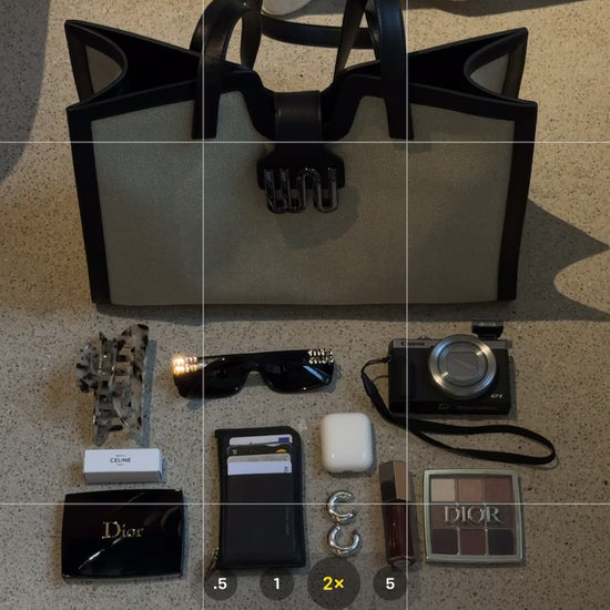 black tote bag made up of black leather