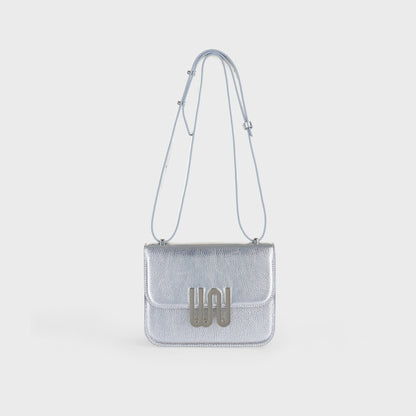 White Noise The Label Pyrite Sleek Silver crossbody, front view with strap