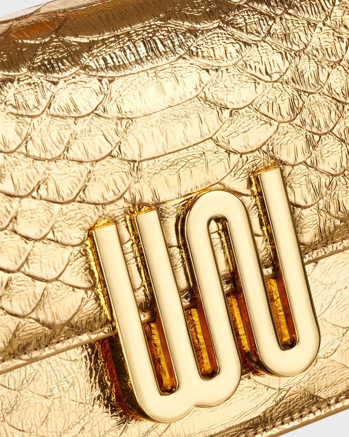 White Noise The Label Selenite Golden, gold WN hardware close-up on python-embossed leather