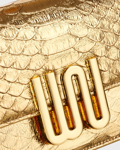 White Noise The Label Selenite Golden, gold WN hardware close-up on python-embossed leather